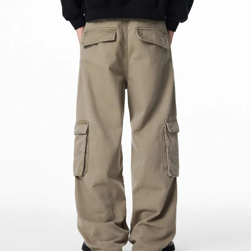 Loose straight-leg cotton cargo pants for men, charcoal gray, with multiple pockets and zipper fly