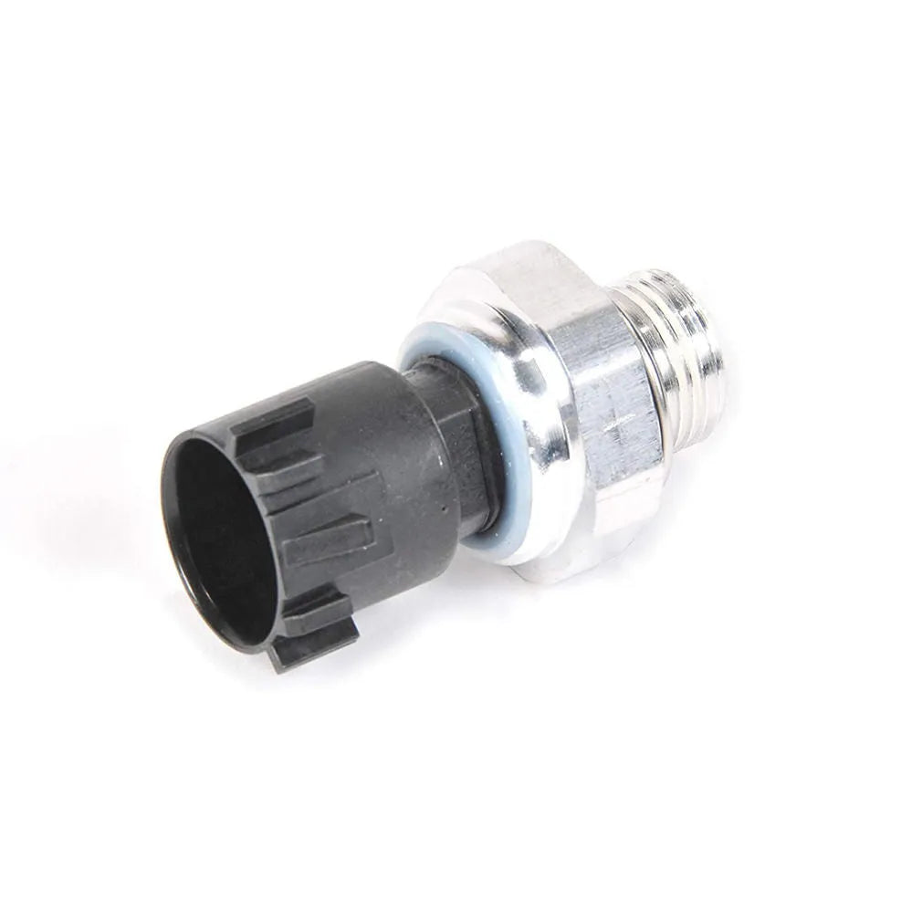 Silver automobile fuel pressure sensor replacement part on a white background.