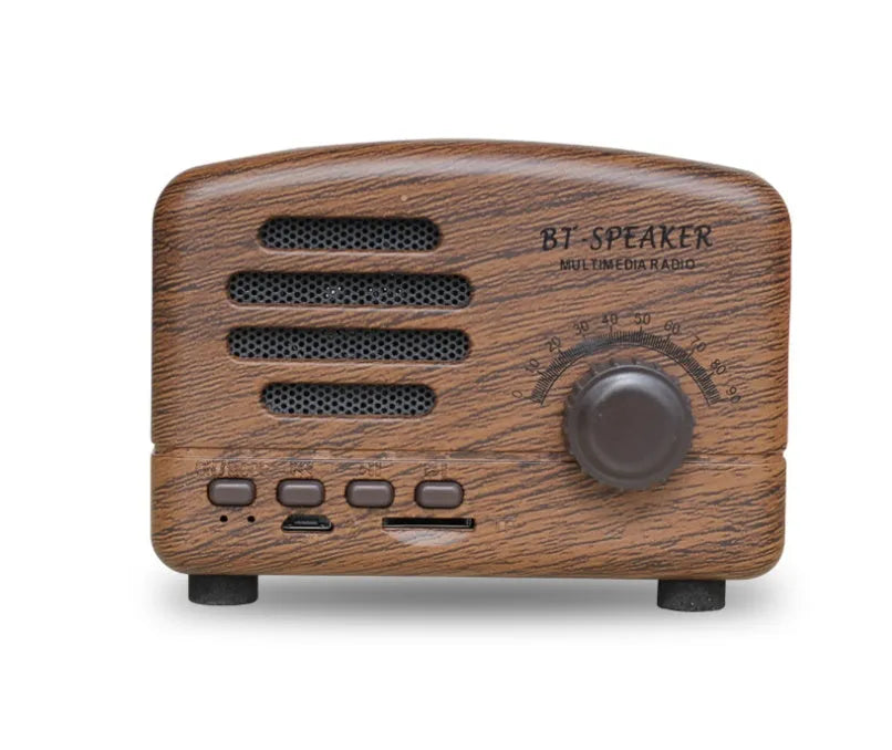 Vintage wood finish Bluetooth speaker in black colour on a wooden surface