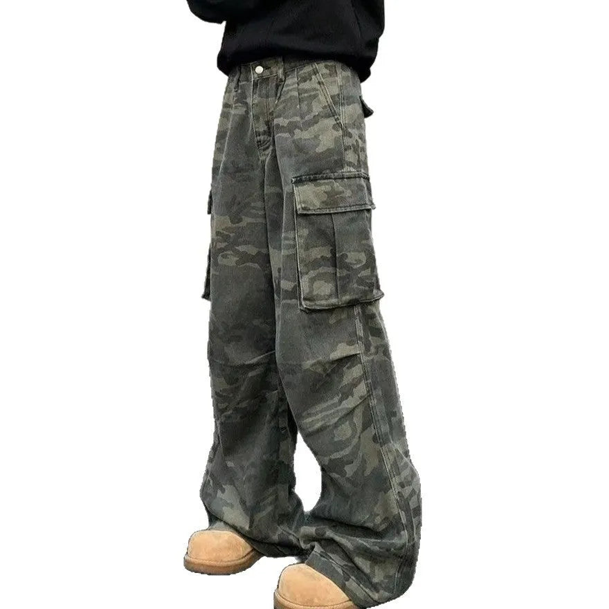 Cotton blend cargo pants in a washed camouflage print with multiple pockets and a mid waist.