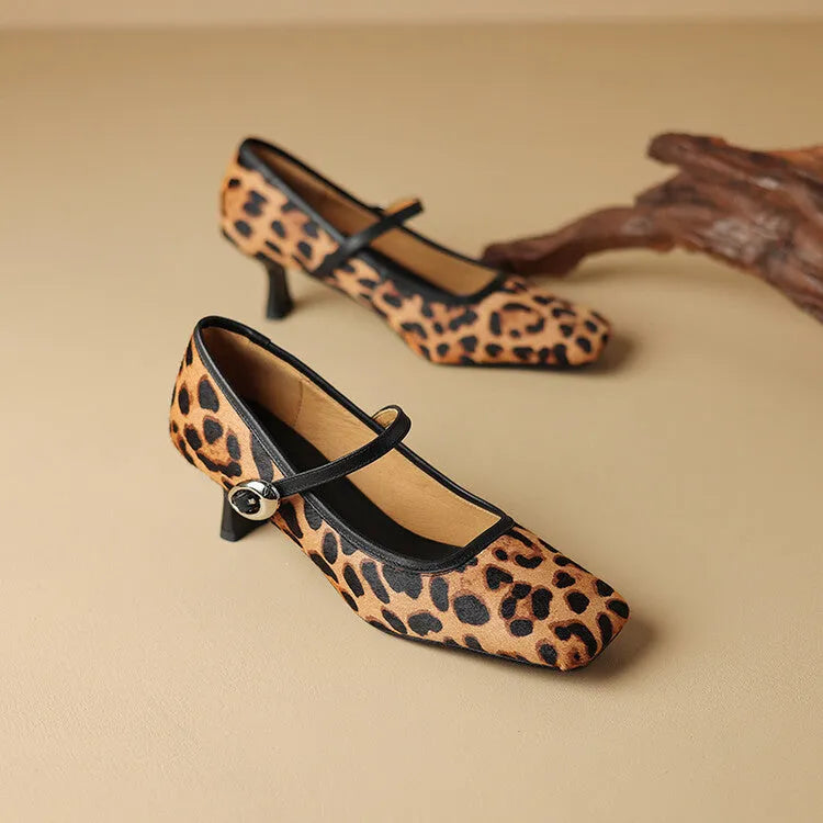 Women's black square toe stiletto ankle-strap shoes with a horse hair upper and buckle fastening.