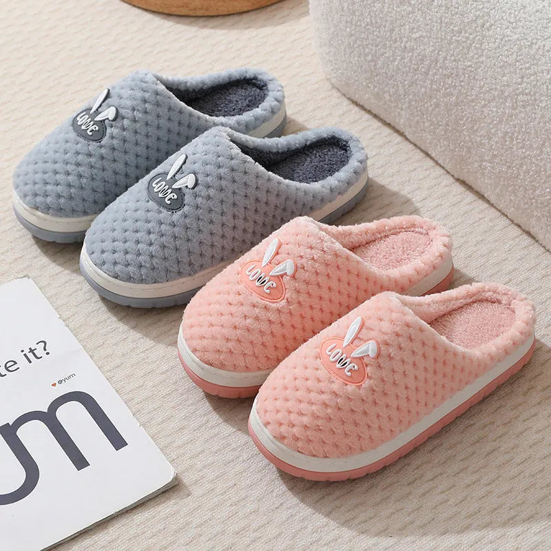 Women's rabbit plaid artificial fur house slippers with a thick rubber non-slip sole in a selection of colours.