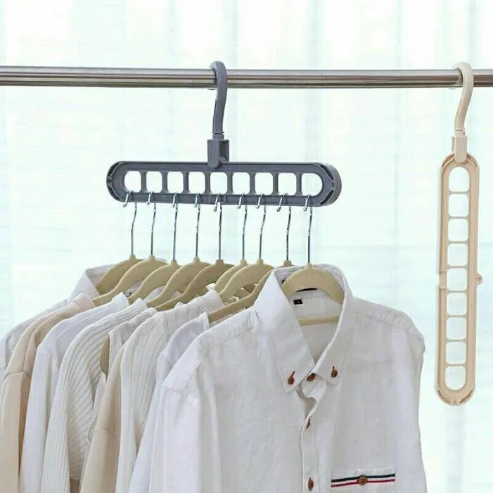 Plastic coat hanger with rotating hook in pink colour, showing length and height dimensions