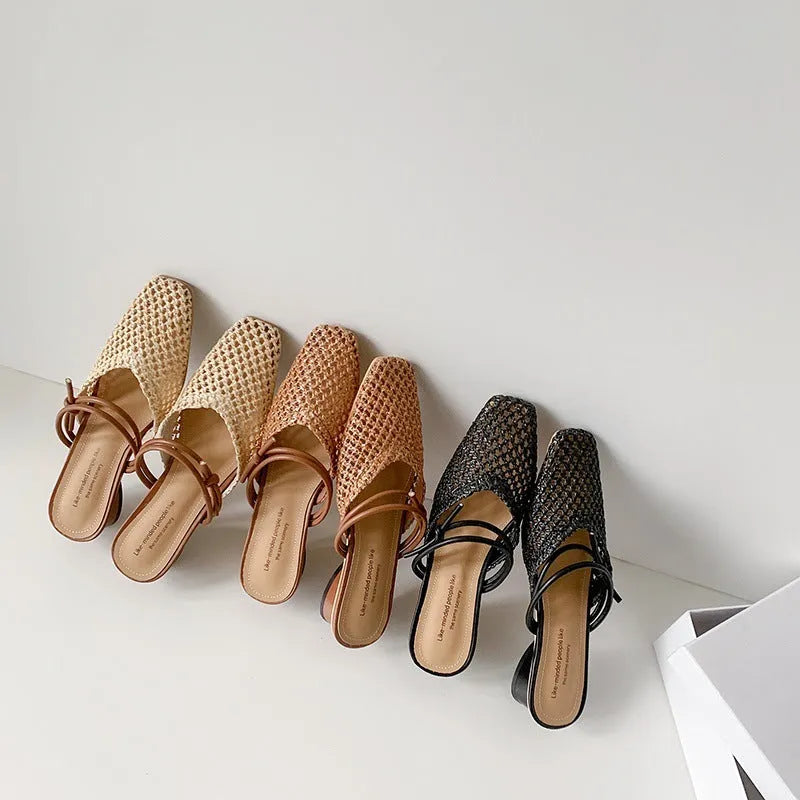 Women's black retro square toe slippers with chunky mid heel and breathable hollow-out PU upper.