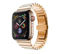 Silver metal Apple Watch strap with butterfly buckle on a 42mm watch case.
