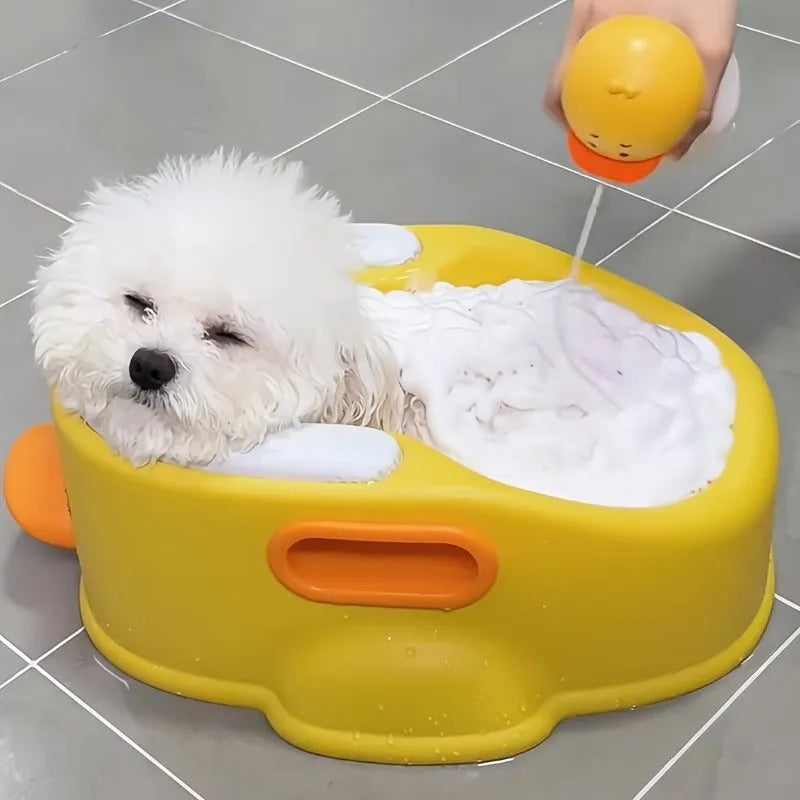 Blue PVC duck-shaped foldable bathtub for washing dogs and cats on a flat surface