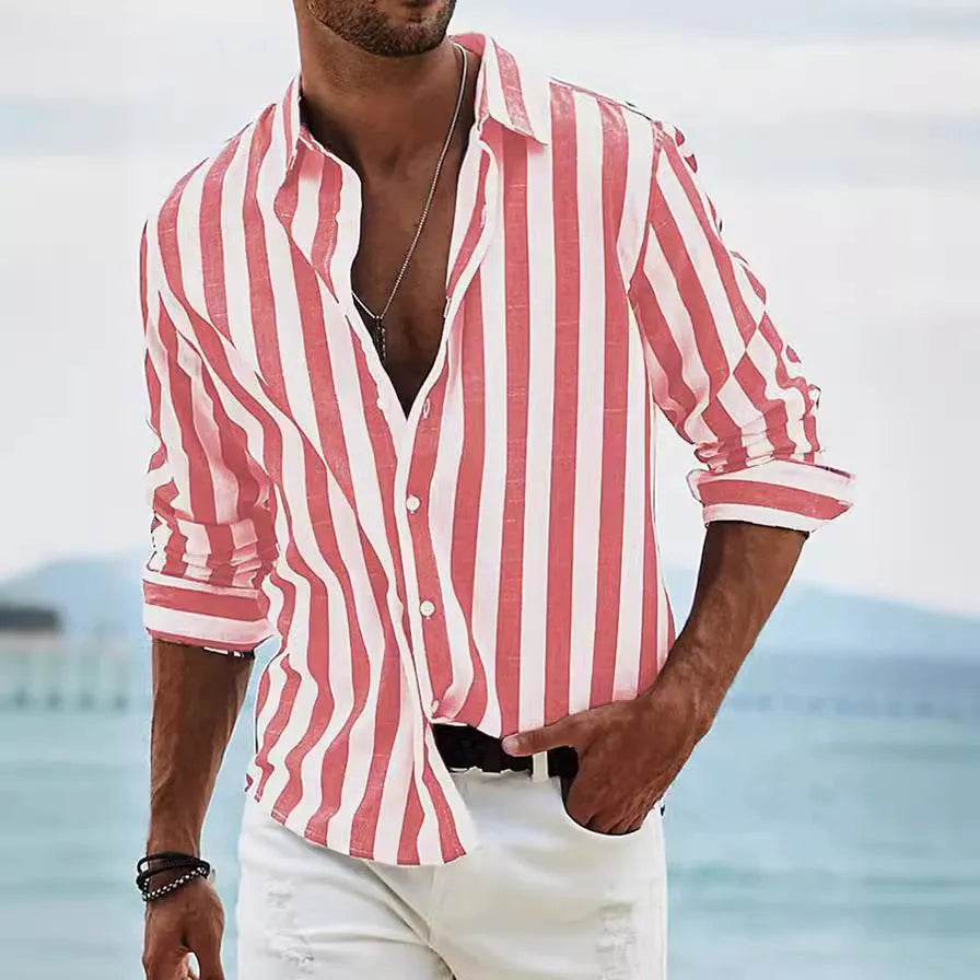 Man wearing a loose grey striped long-sleeved casual shirt with a cardigan style.
