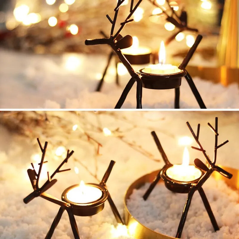 Black iron Christmas candlestick holder with decorative elk design on a festive table.