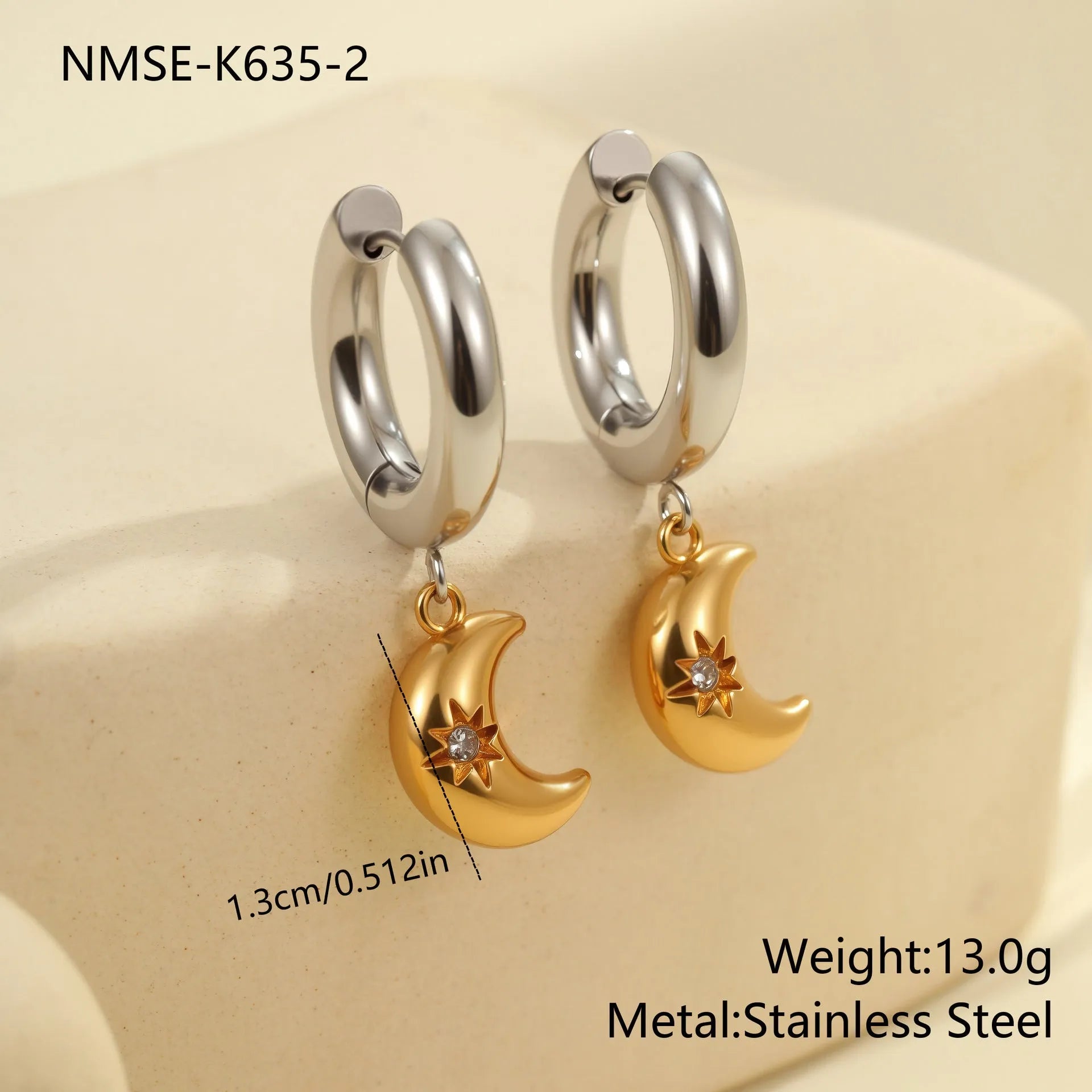 Christmas tree heart earrings in stainless steel with 18K gold plating showing star and geometric shapes