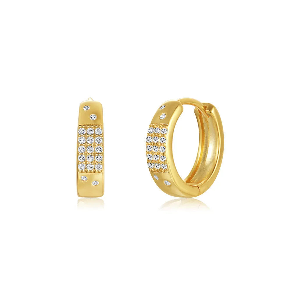 Golden brass diamond earclip earrings with simple geometric round design on white background