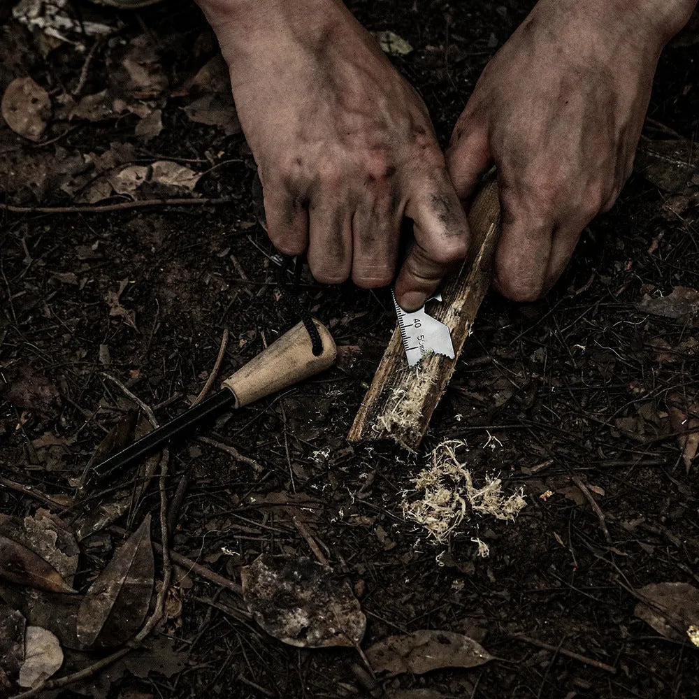 Portable outdoor flint camping sparkstone in cylindrical shape on natural background