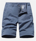 Men's blue printed denim shorts with a loose, casual straight fit on a hanger