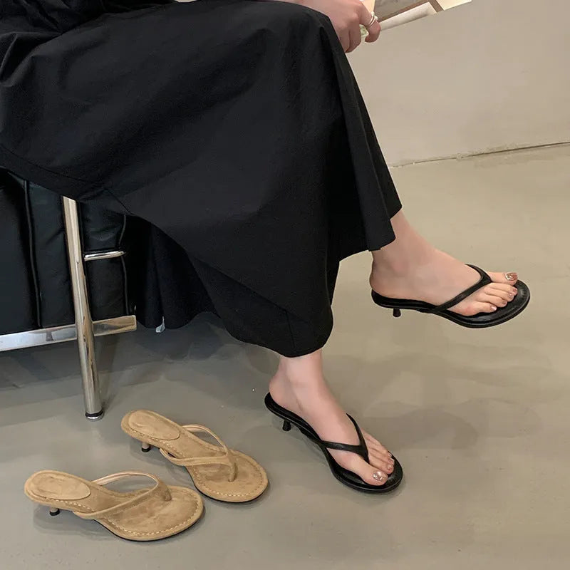 Women's simple round toe stiletto sandals in rubber, shown in classic black and sheepskin camel colours.