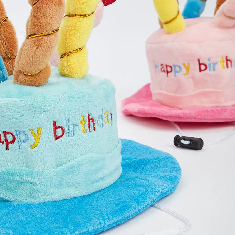 Blue or pink dog birthday hat with elastic chin strap measuring 21x15x6.5cm