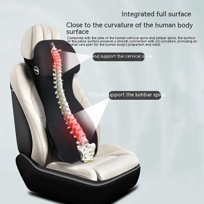 Black memory foam automotive lumbar support cushion with integrated headrest on a car seat.