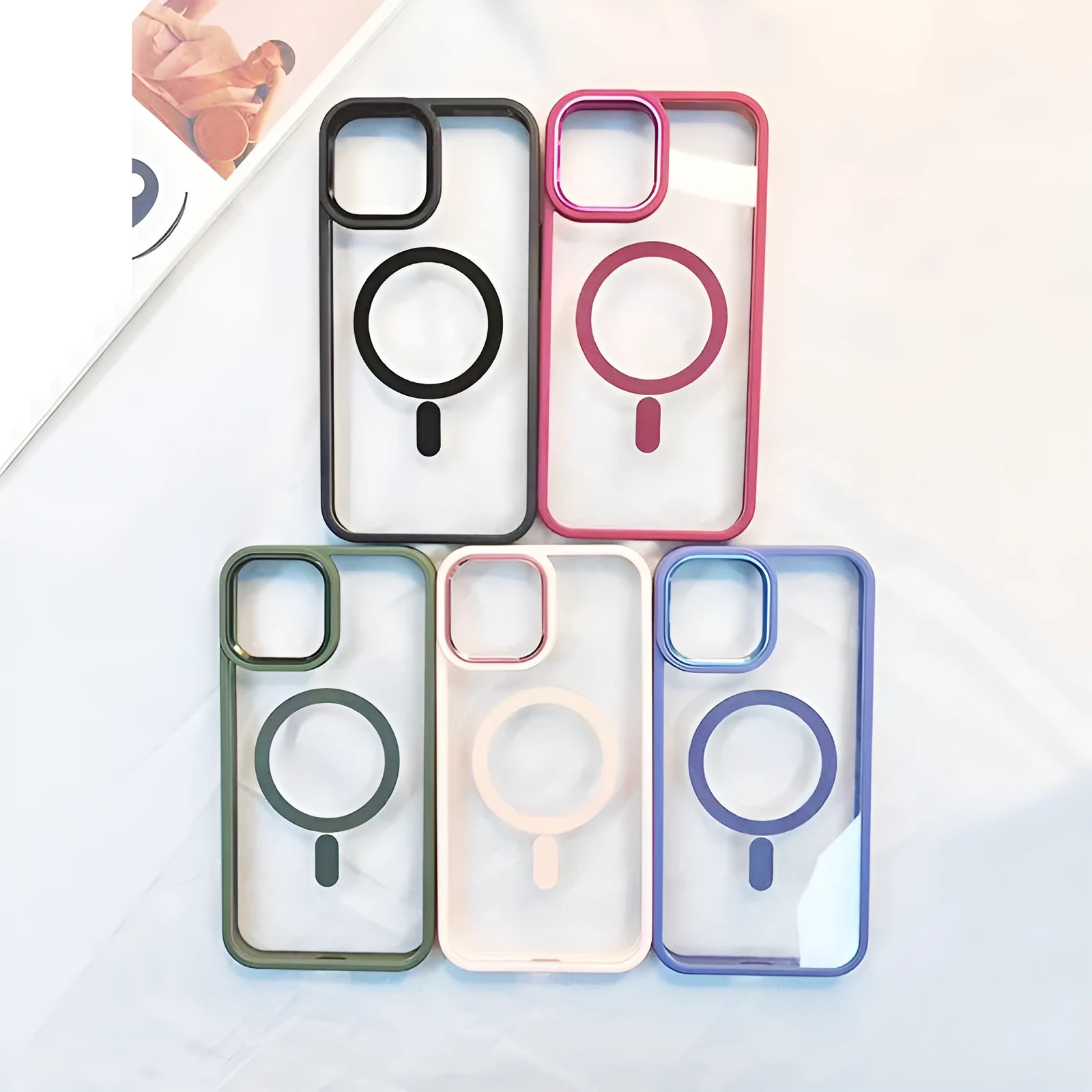 Magnetic transparent silicone phone case for iPhone with solid colour edges, shown in plum red.