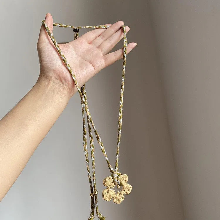 Gold hibiscus rosa-sinensis resin pendant necklace with artificial crystal bow on alloy chain for ladies
