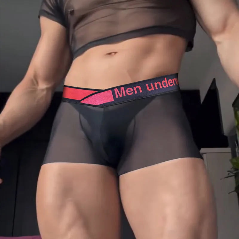 Men's black low waist underwear with a red and white gradient laser pattern, seamless design.