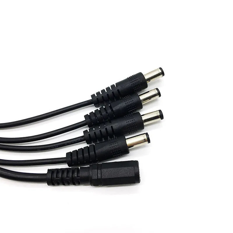 Black 12V DC 1-to-4 monitoring power splitter cable with 5.5mm connectors for CCTV cameras