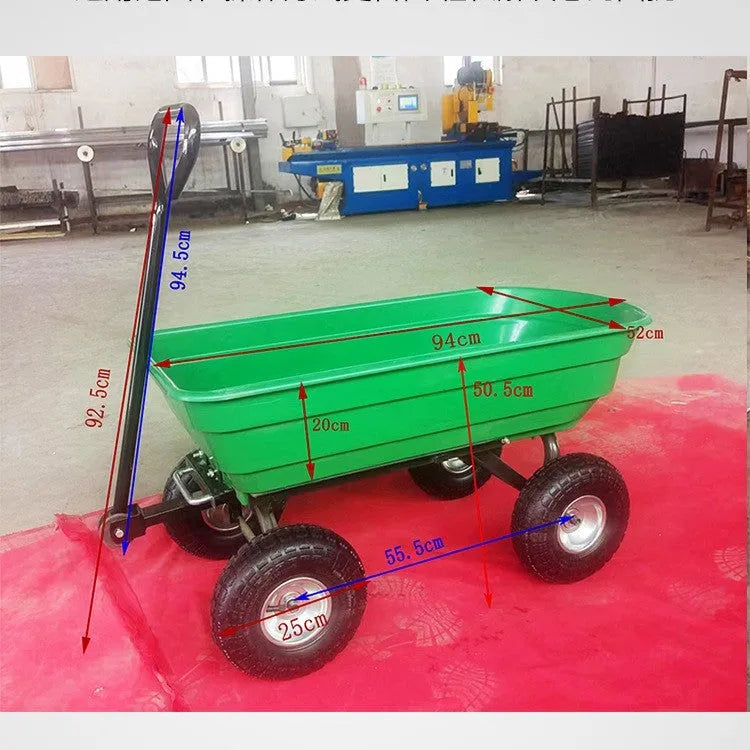 Green four-wheel plastic dump truck with steel PP construction and a tilting cargo bed.