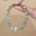 Light green emerald jadeite half bracelet with ice-like texture and round beads