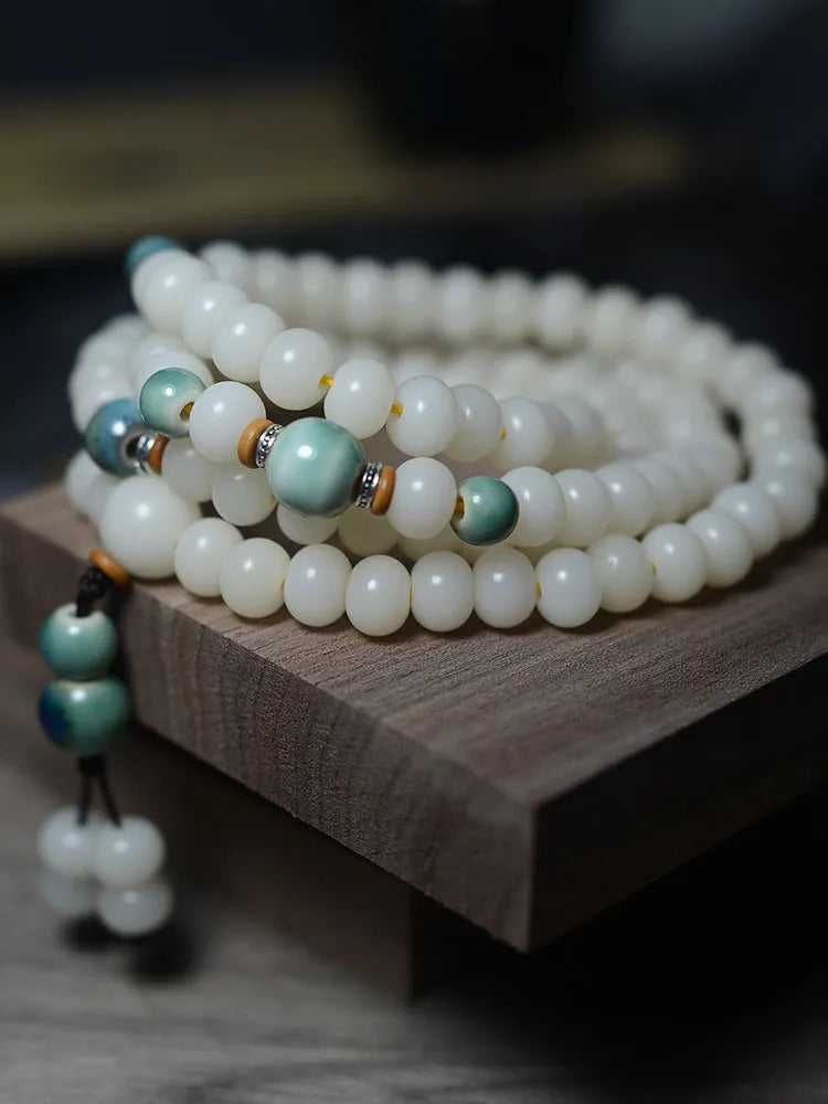 White jade bodhi root bracelet with 108 flat round beads in two sizes