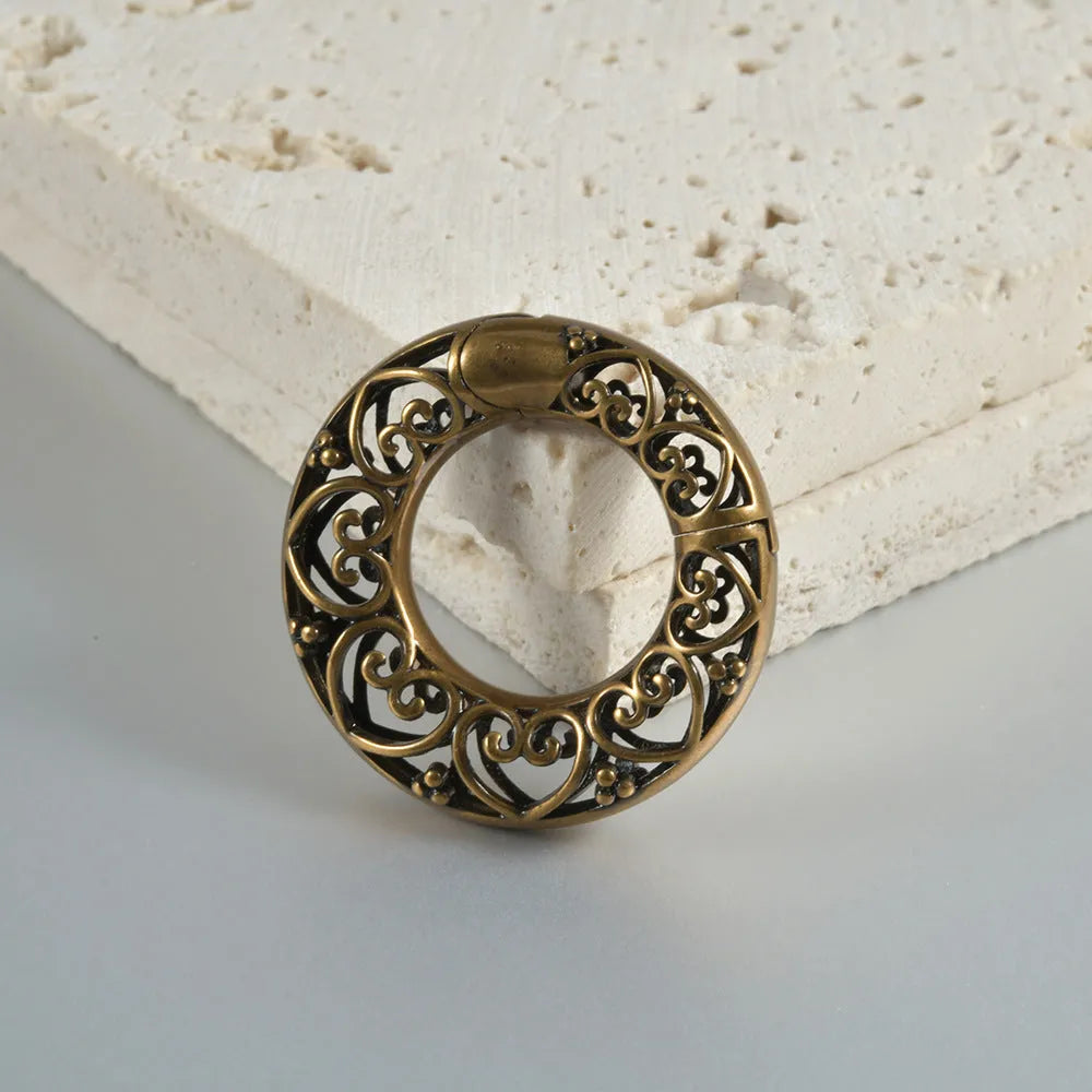 Retro geometric heart and lotus shaped magnetic earrings in antique silver and ancient gold finishes