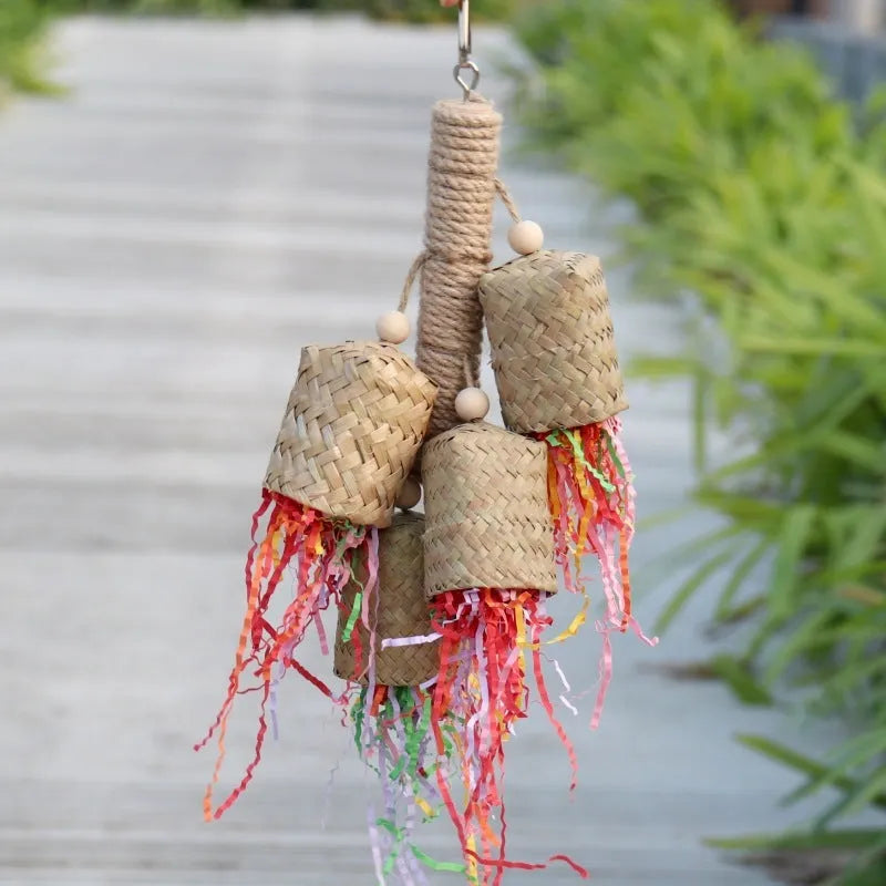 Colourful shredded paper parrot chewing toy with wood and sisal rope construction