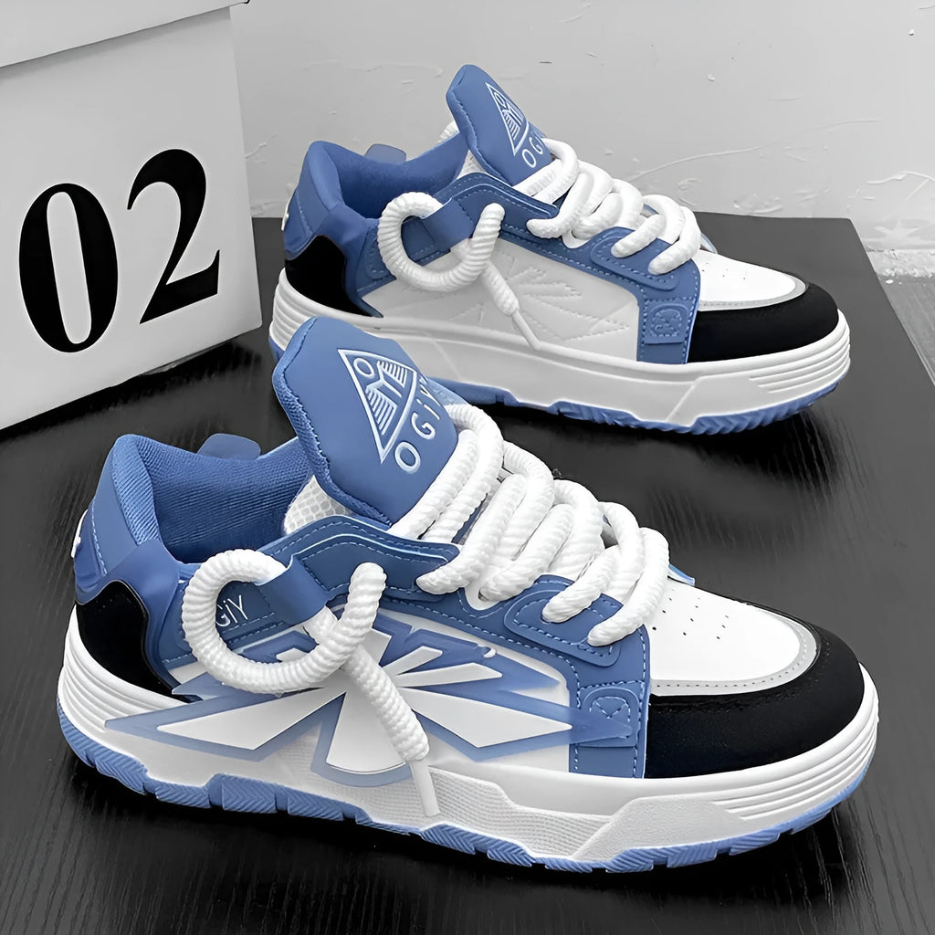 Men's white clunky sneakers with cartoon pattern, synthetic leather upper, rubber sole, and lace-up front.