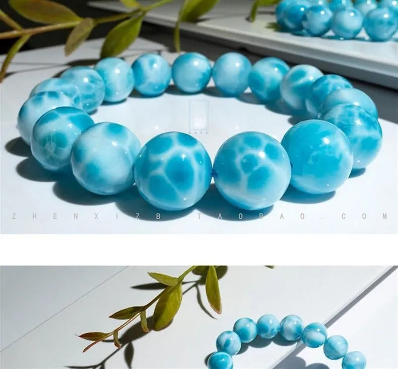 Blue Bodhi bracelet with pearl elements, showing Maillard style and range of bead sizes.