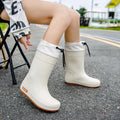 Women's solid colour PVC rain boots with non-slip soles in apricot waterproof mouth