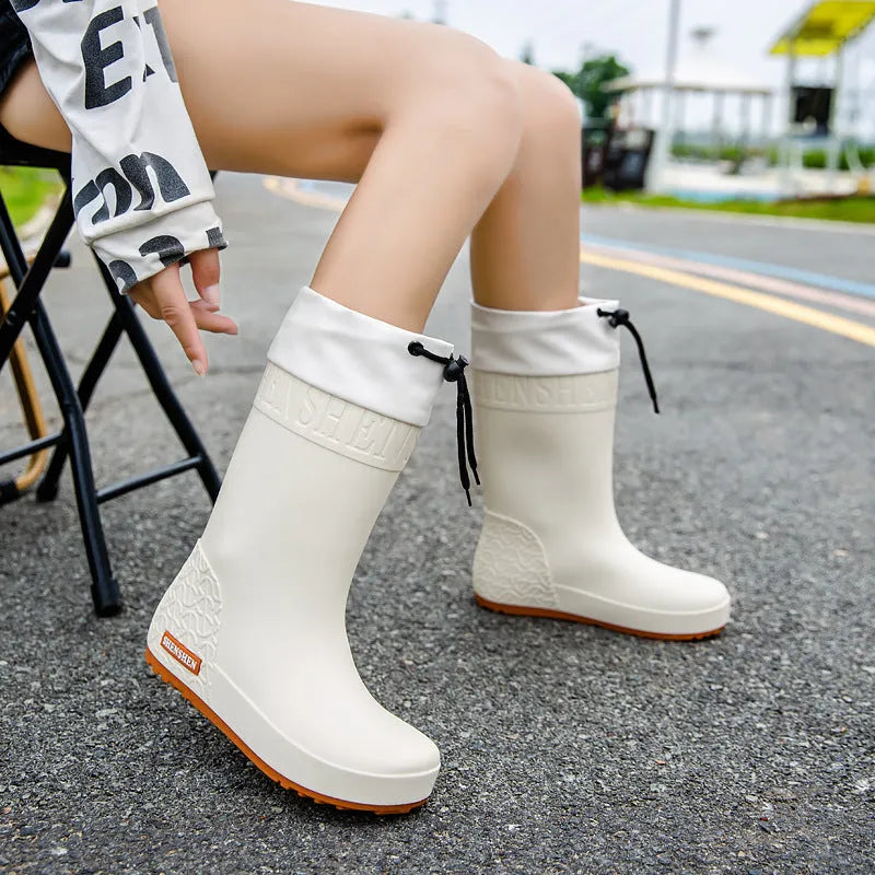 Women's solid colour PVC rain boots with non-slip soles in apricot waterproof mouth