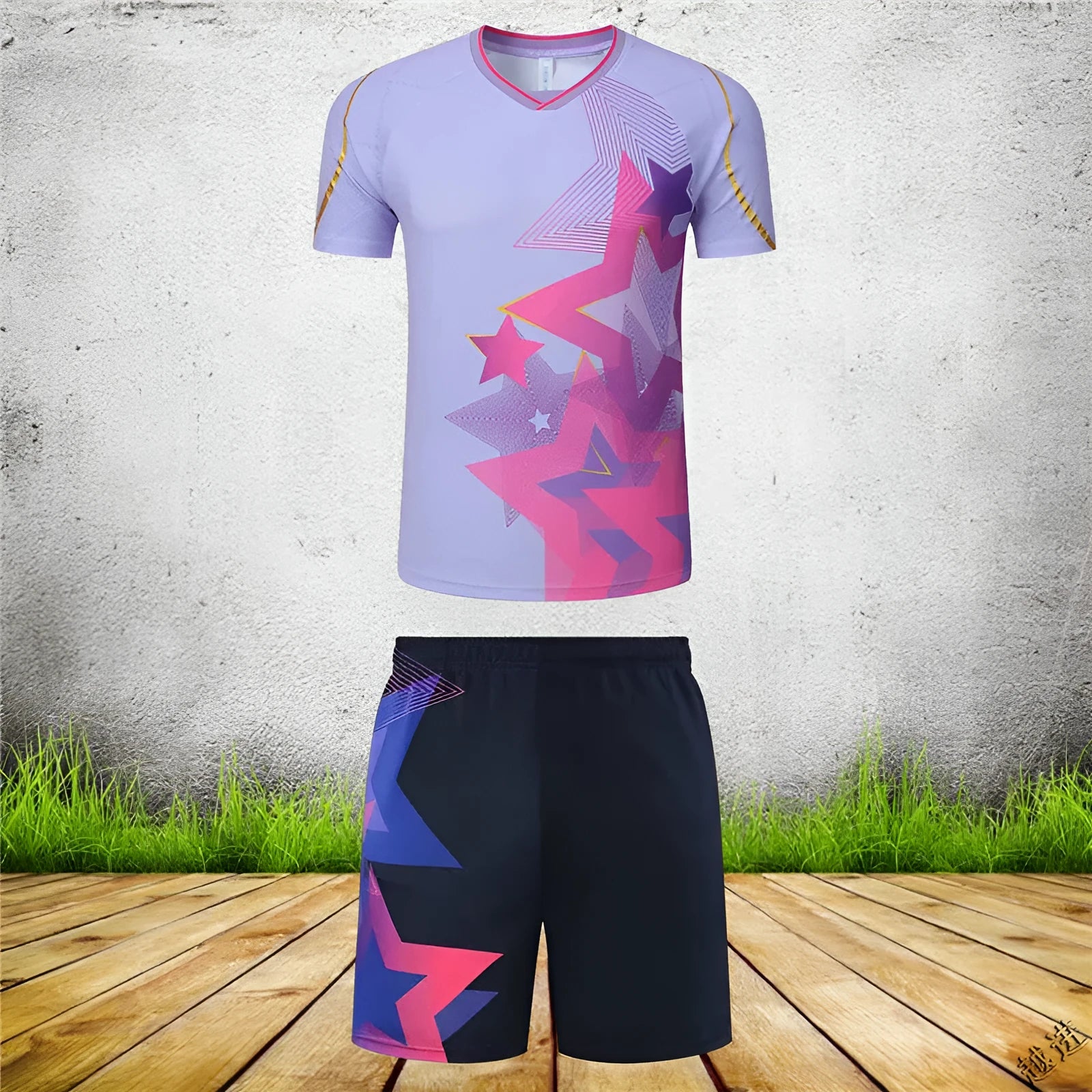 Badminton sportswear outfit set showing a short-sleeved top and matching trousers in a blue colour.