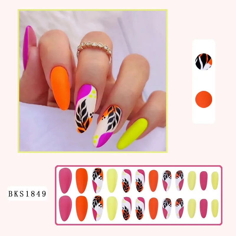 Wear Armour brand medium almond shaped frosted nail sticker set showing four different designs: French colourful leaf, colourful plating, star flash macaron, and gradient leopard print.