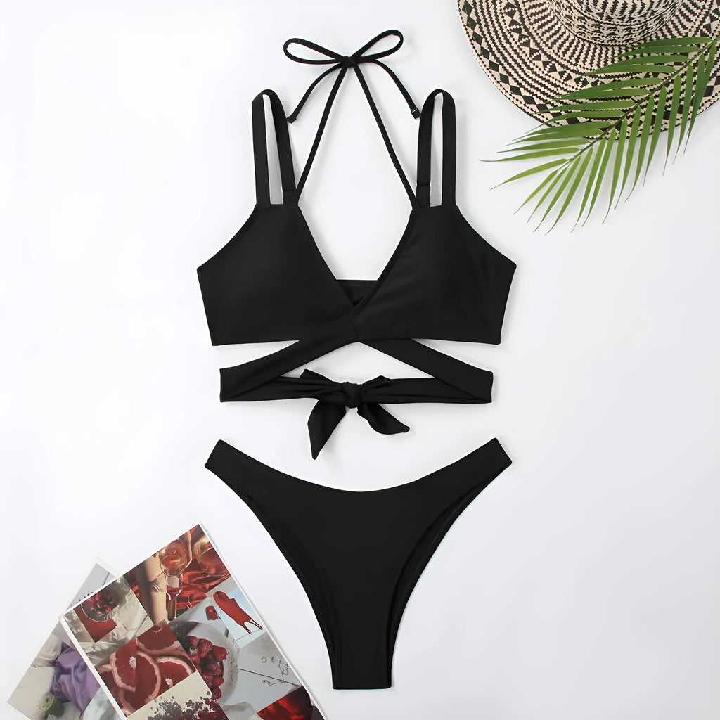 Women's solid colour strap bikini swimsuit showing briefs style in one of five colour options