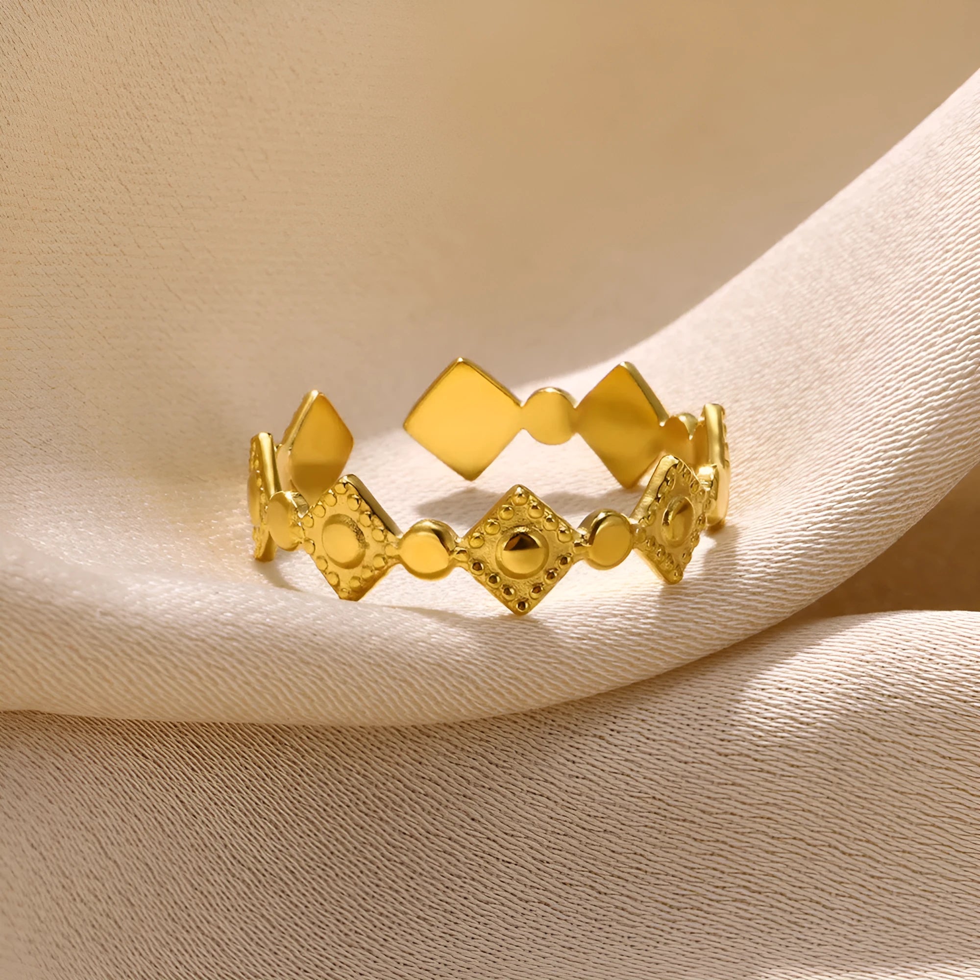 Gold geometric titanium steel women's ring with diamond pattern detailing