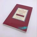 Paperback copy of The Intelligent Investor book by Benjamin Graham, front cover showing title and author.