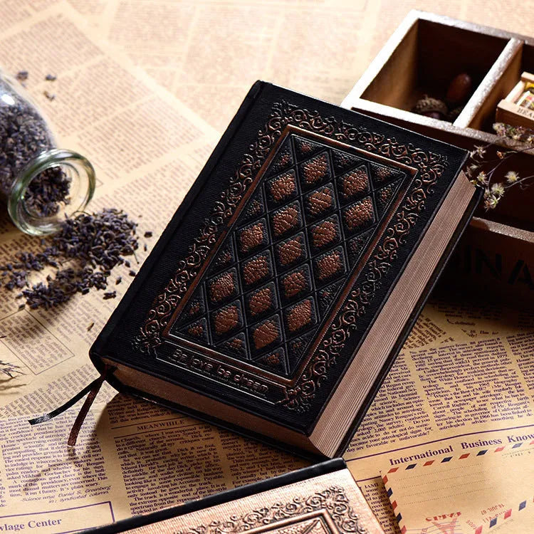 Embossed faux leather notepad with three-dimensional textured cover in bronze and black gold colour options