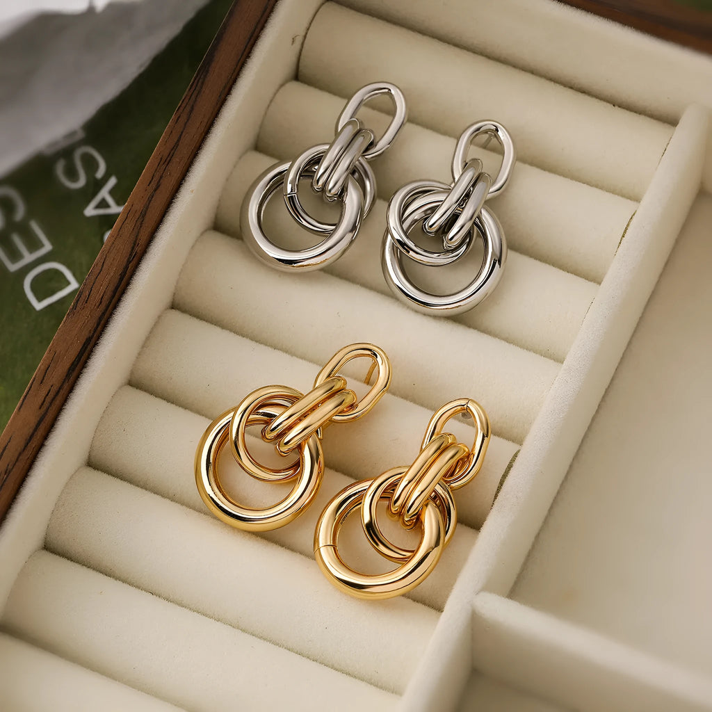 Geometric gold-colour copper earrings with irregular asymmetric design for women