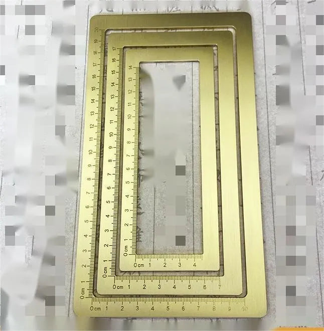 Solid brass calligraphy weight brush and paper scale with decorative carved designs