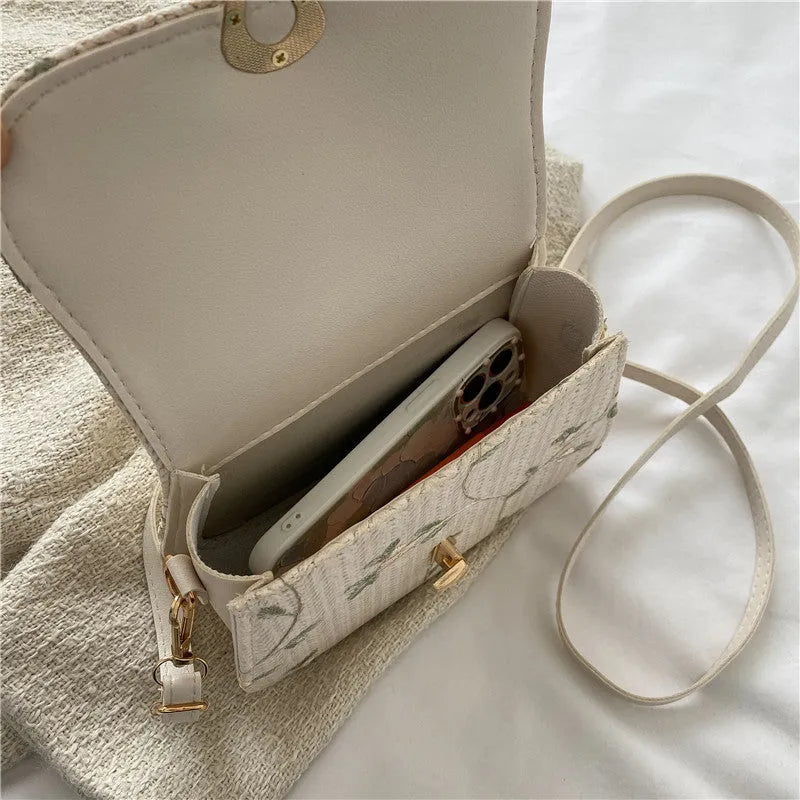 Straw woven satchel handbag with floral pattern in white colour option, single shoulder strap, summer beach bag