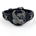 Black leather geometric bracelet with eagle watch button, showing tapered width.