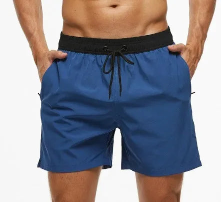 Men's blue athletic shorts with stitching waistband, drawstring and headband for running