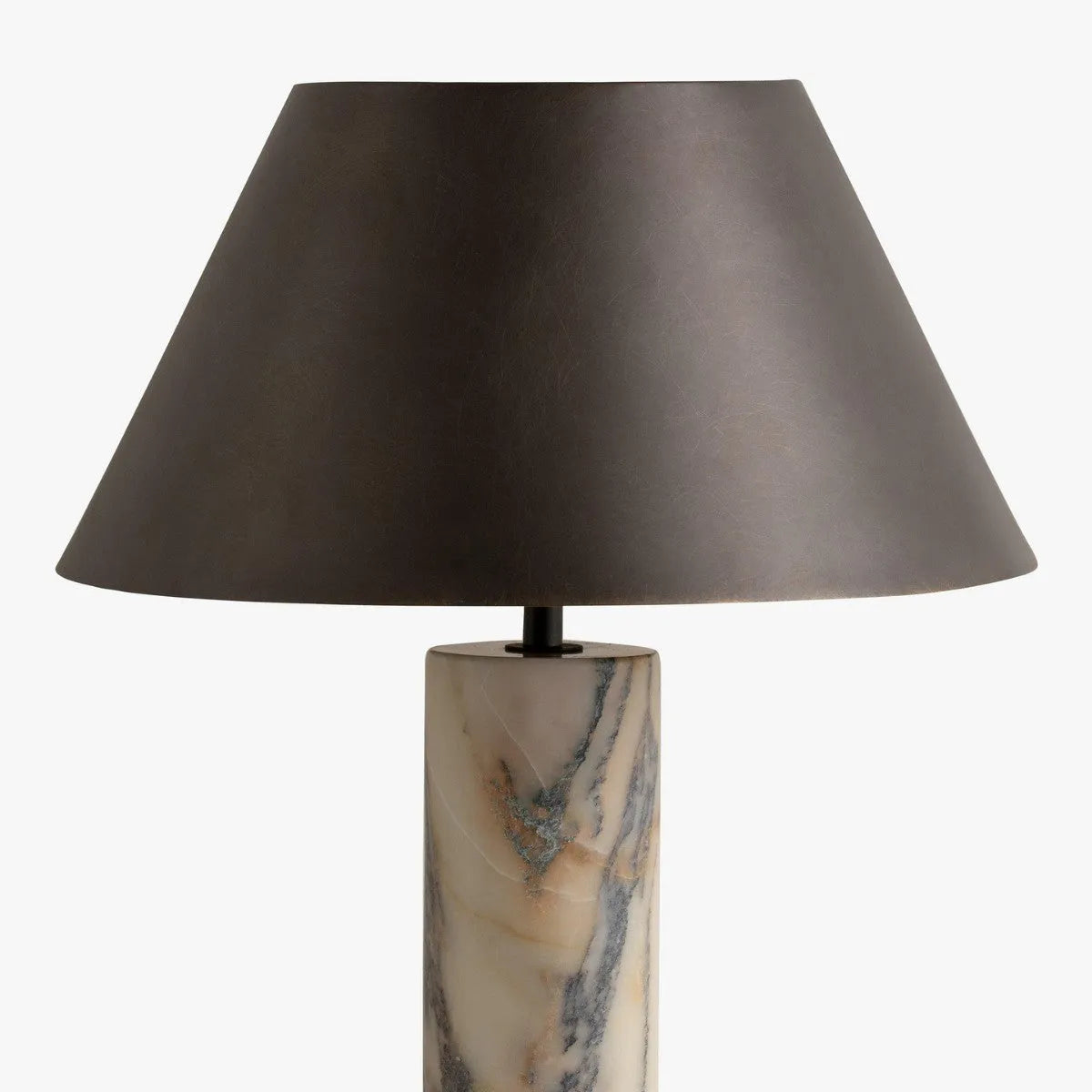 Modern black shade table lamp with marble base on wooden surface