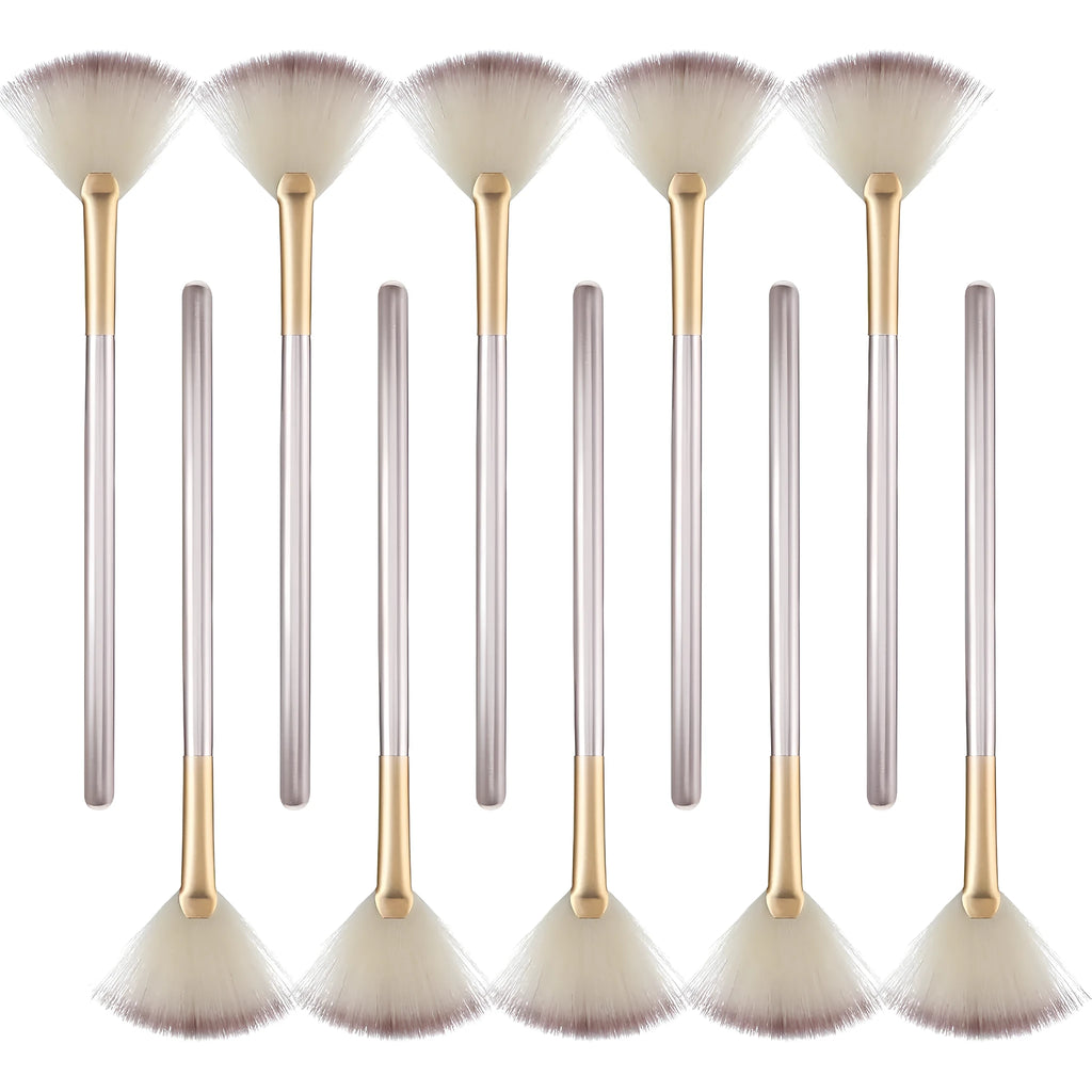 Set of 10 champagne-coloured wooden handle fan brushes with soft fibres and protective covers.