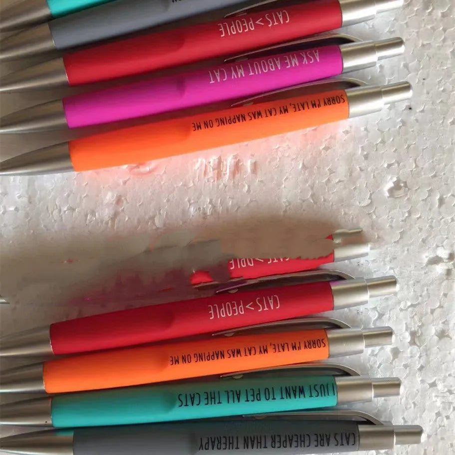 Set of five automatic push-action coloured pens in a beaded bag, with cat or dog design options.