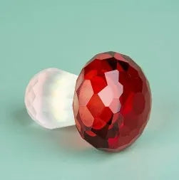 Geometric crystal mushroom decoration in transparent, green, red, or yellow measuring 40mm by 53mm