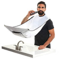 Shaving apron 110x70cm in black with transparent suction cup on bathroom mirror