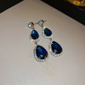 Silver needle water drop earrings and necklace set with blue zircon pendant on clavicle chain court style