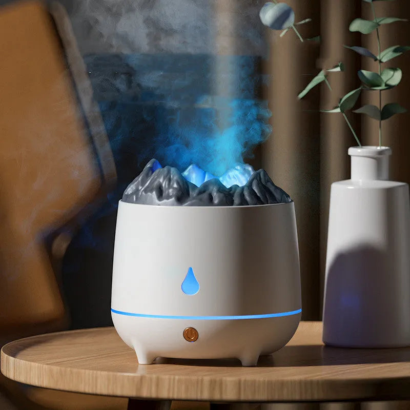 Volcano-shaped white humidifier with USB cable and mist rising from single outlet